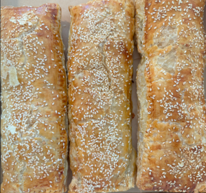 Bourikas filled with Shredded Beauty roast and sautéed onions