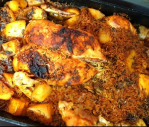 Whole Chicken filled with Rice and vegetables